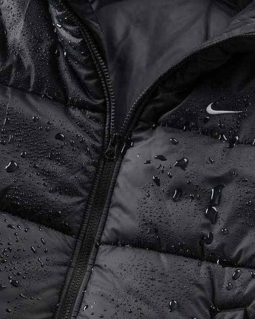 Дълго дамско яке NIKE W NSW TF SNFL NK CLSC PRKA Дълго дамско яке NIKE W NSW TF SNFL NK CLSC PRKA